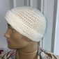 Mannequin wearing a white crochet Headwarmer